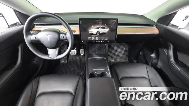 Tesla Model Y — Фото автомобиля 10