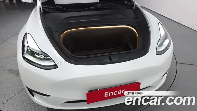 Tesla Model Y — Фото автомобиля 6