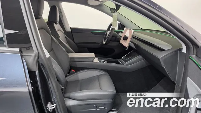 Tesla Model Y — Фото автомобиля 16