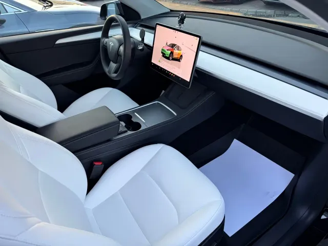 Tesla Model Y — Фото автомобиля 20
