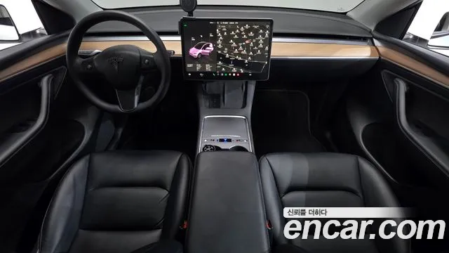 Tesla Model Y — Фото автомобиля 10