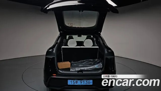 Tesla Model Y — Фото автомобиля 19