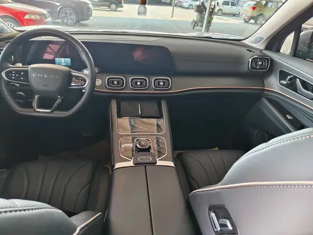 Chery Tiggo 9 — Фото автомобиля 9