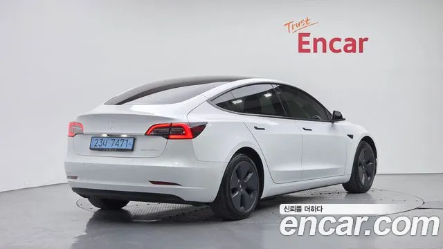 Tesla Model 3 — Фото автомобиля 2