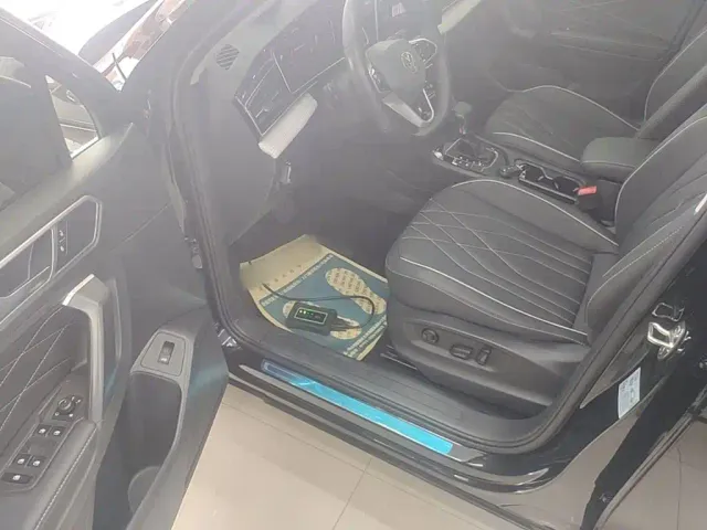 Volkswagen Tiguan L — Фото автомобиля 15