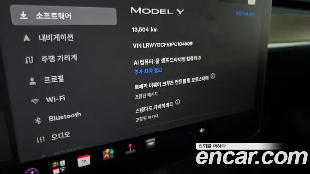 Tesla Model Y — Фото автомобиля 11