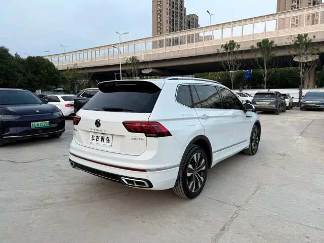 Volkswagen Tiguan L — Фото автомобиля 10