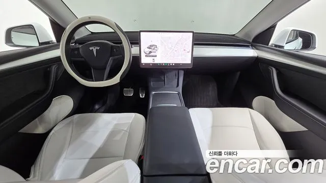 Tesla Model Y — Фото автомобиля 6