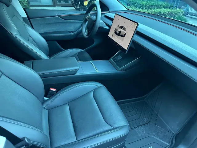 Tesla Model Y — Фото автомобиля 7