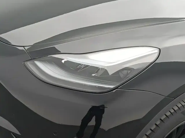 Tesla Model Y — Фото автомобиля 13
