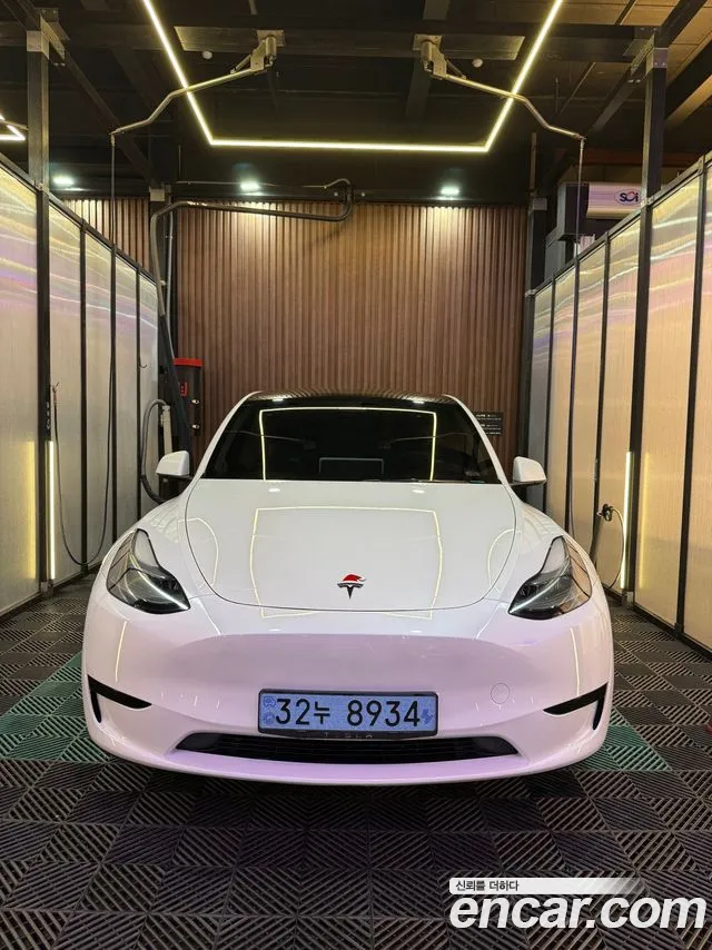 Tesla Model Y — Фото автомобиля 11