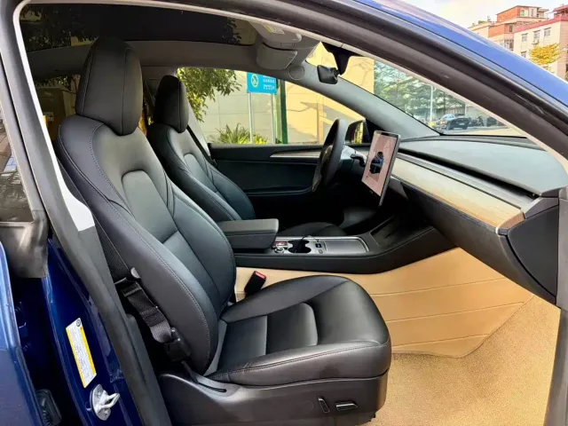 Tesla Model Y — Фото автомобиля 11