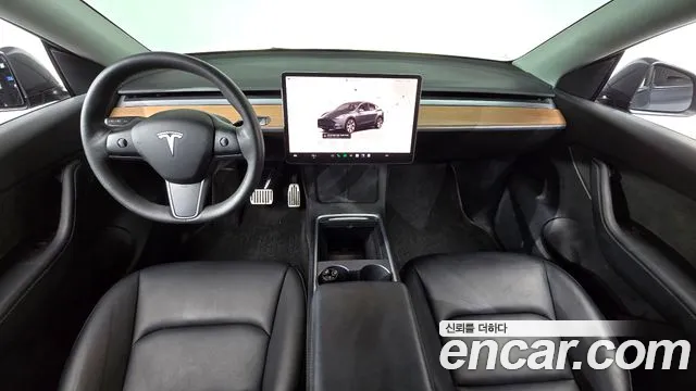 Tesla Model Y — Фото автомобиля 7