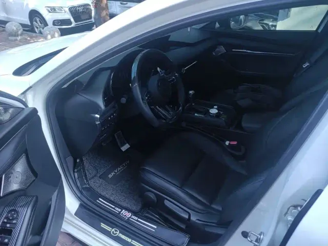Mazda Axela — Фото автомобиля 14