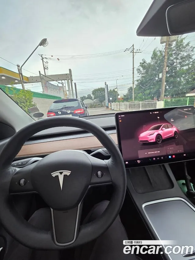 Tesla Model Y — Фото автомобиля 8