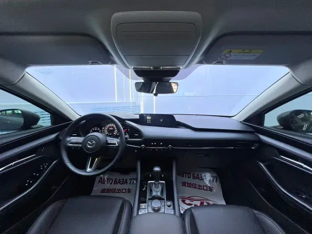 Mazda Axela — Фото автомобиля 14