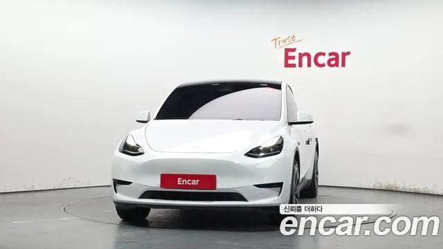 Tesla Model Y — Фото автомобиля 3