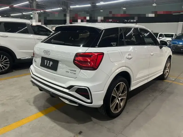 Audi Q2L — Фото автомобиля 6