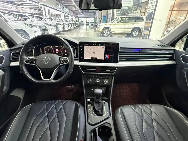 Volkswagen Tiguan L — Фото автомобиля 10