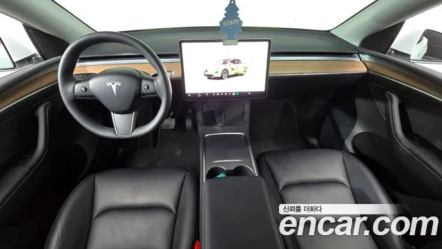 Tesla Model Y — Фото автомобиля 9