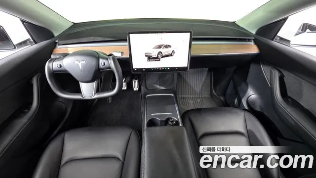 Tesla Model Y — Фото автомобиля 10