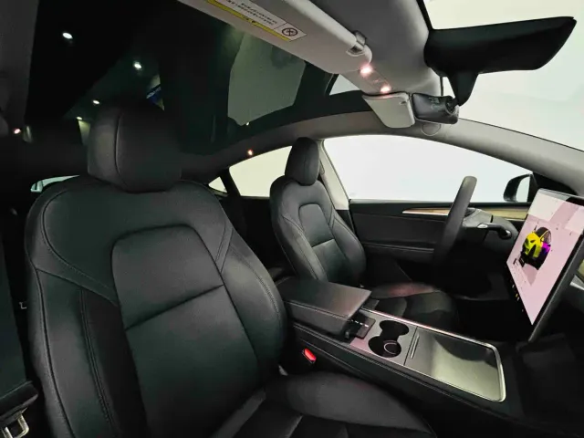 Tesla Model Y — Фото автомобиля 25