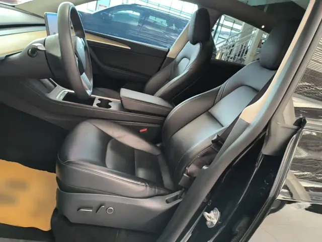 Tesla Model Y — Фото автомобиля 14