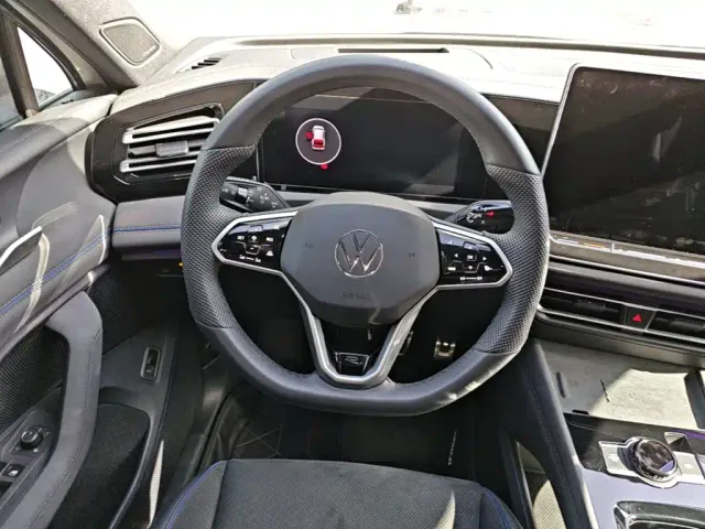 Volkswagen Tiguan L — Фото автомобиля 10