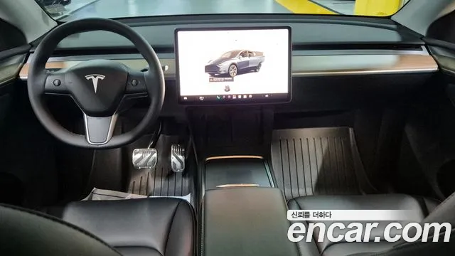 Tesla Model Y — Фото автомобиля 7