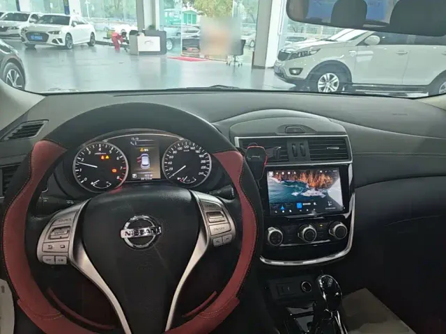 Nissan Tiida — Фото автомобиля 9