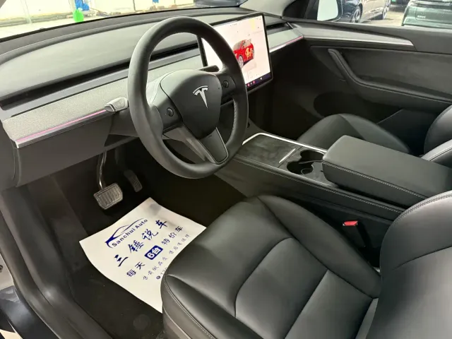 Tesla Model Y — Фото автомобиля 7
