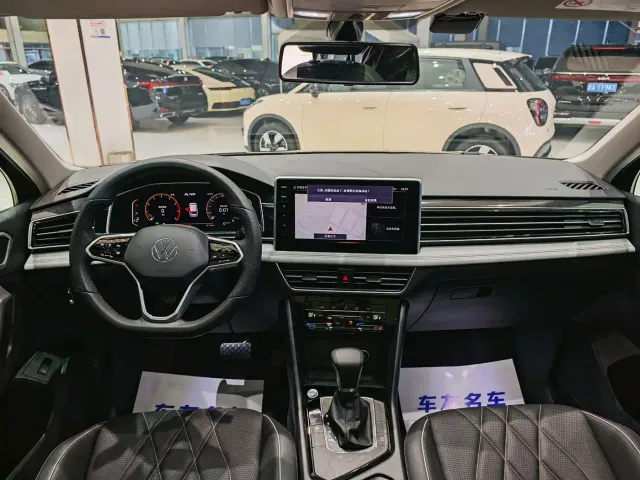 Volkswagen Tiguan L — Фото автомобиля 8