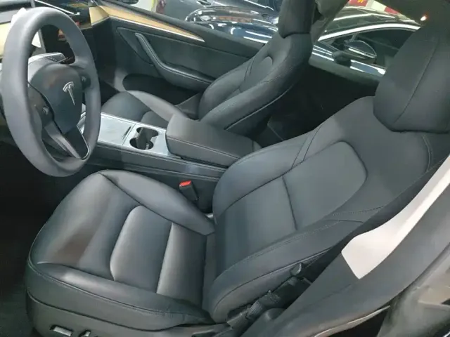 Tesla Model Y — Фото автомобиля 14