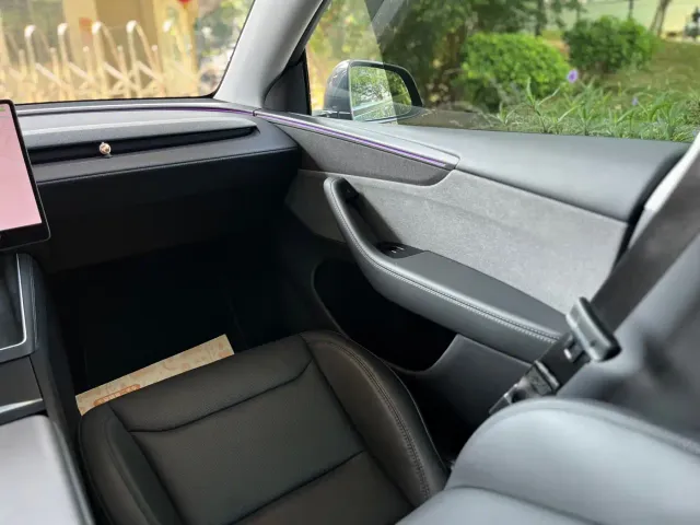 Tesla Model Y — Фото автомобиля 16
