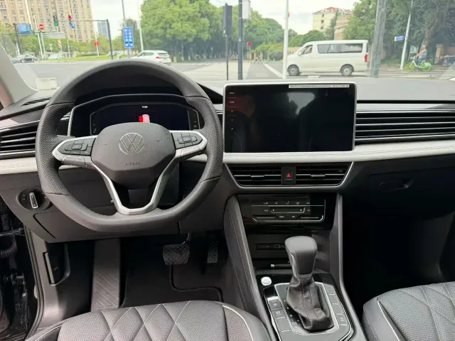 Volkswagen Tiguan L — Фото автомобиля 6