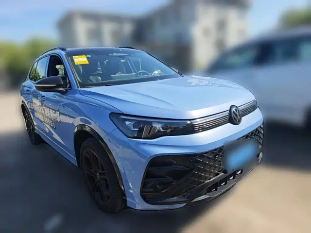 Volkswagen Tiguan L — Фото автомобиля 5