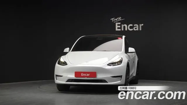 Tesla Model Y — Фото автомобиля 3