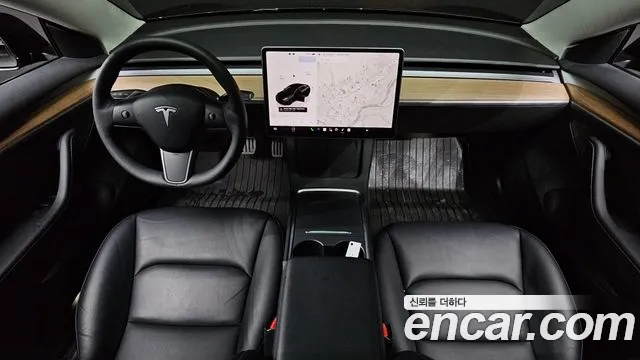 Tesla Model 3 — Фото автомобиля 5