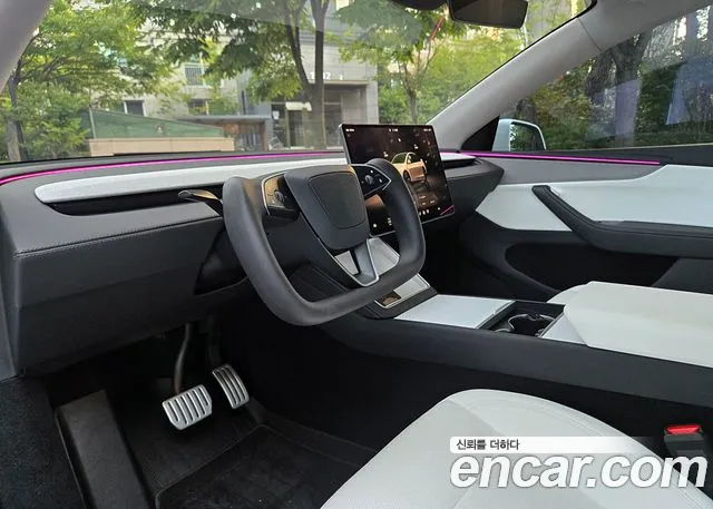 Tesla Model Y — Фото автомобиля 12