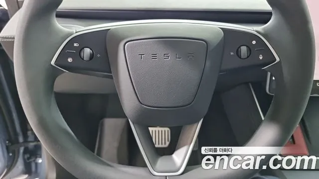 Tesla Model Y — Фото автомобиля 12