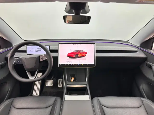 Tesla Model Y — Фото автомобиля 10