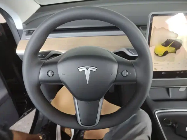 Tesla Model Y — Фото автомобиля 10