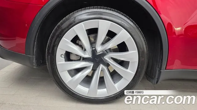 Tesla Model Y — Фото автомобиля 5