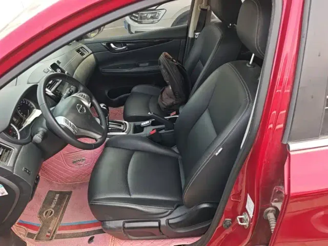 Nissan Tiida — Фото автомобиля 14