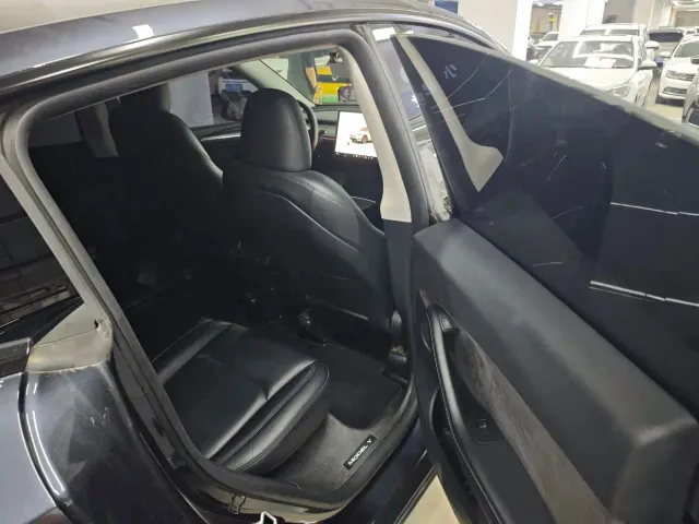 Tesla Model Y — Фото автомобиля 7