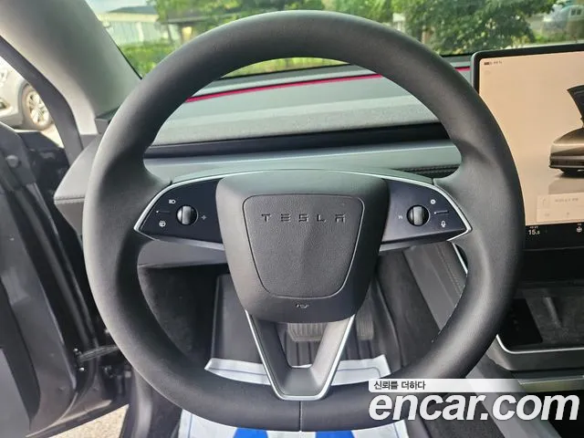 Tesla Model Y — Фото автомобиля 14