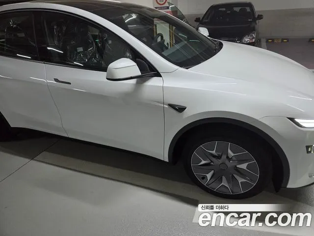 Tesla Model Y — Фото автомобиля 9