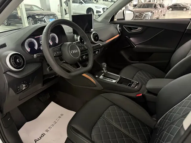 Audi Q2L — Фото автомобиля 6
