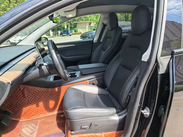 Tesla Model Y — Фото автомобиля 10