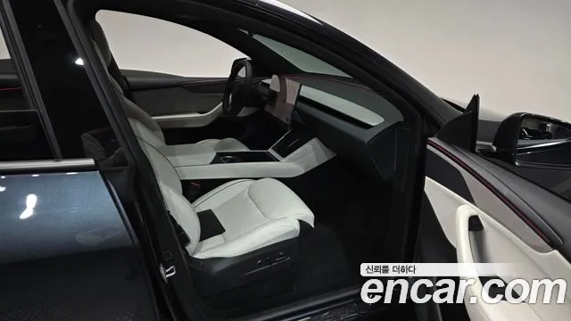 Tesla Model Y — Фото автомобиля 17